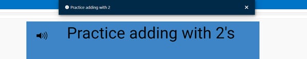 An image of a sound icon next to the words, "practice adding with 2's" and at the top of the screen, a pop up caption saying, "practice adding with 2".